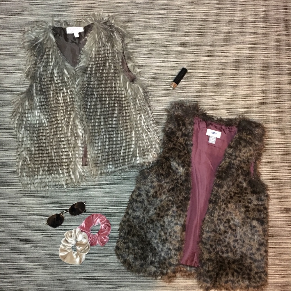 TWO FAUX FUR VESTS